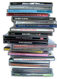 Pile of CDs for Top ten bloke songs