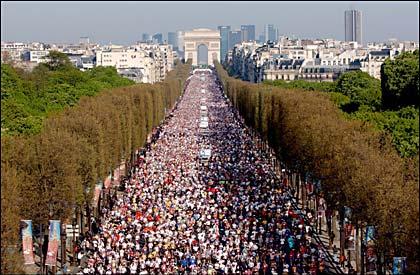 The 2010 Paris Marathon setting off down the Champs-Elysées.