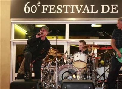 Cannes do: U2 perform at the Cannes premiere of 'U2-3D'